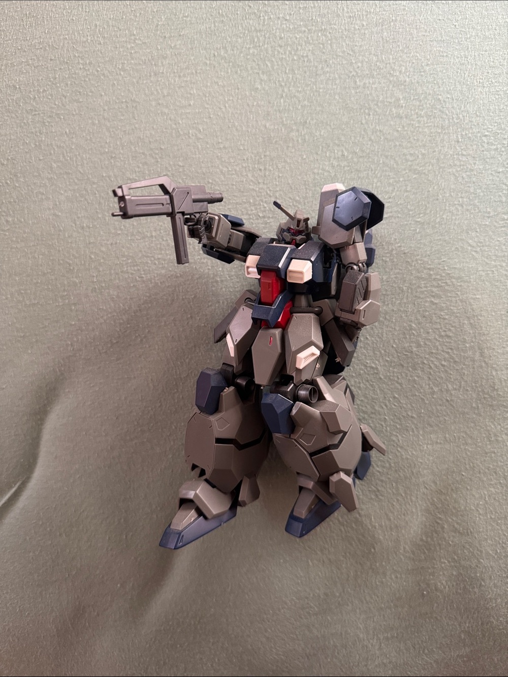 Gray and Navy Mecha Robot Model with Red Accents